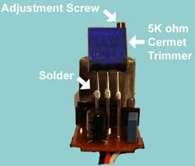 Soldering trimmer on a Futaba S3003 servo